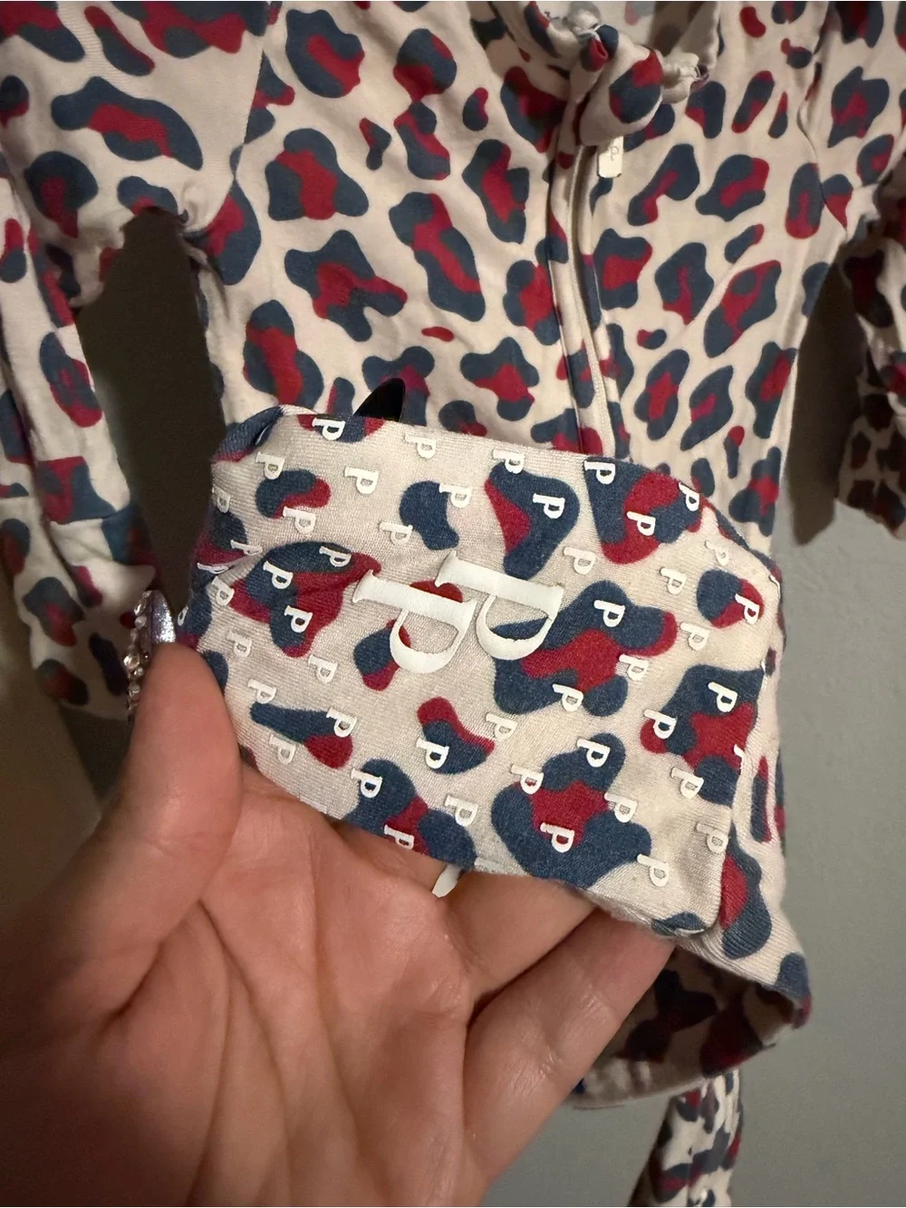 Posh Peanut Cream One-Piece with Red & Blue Leopard Print